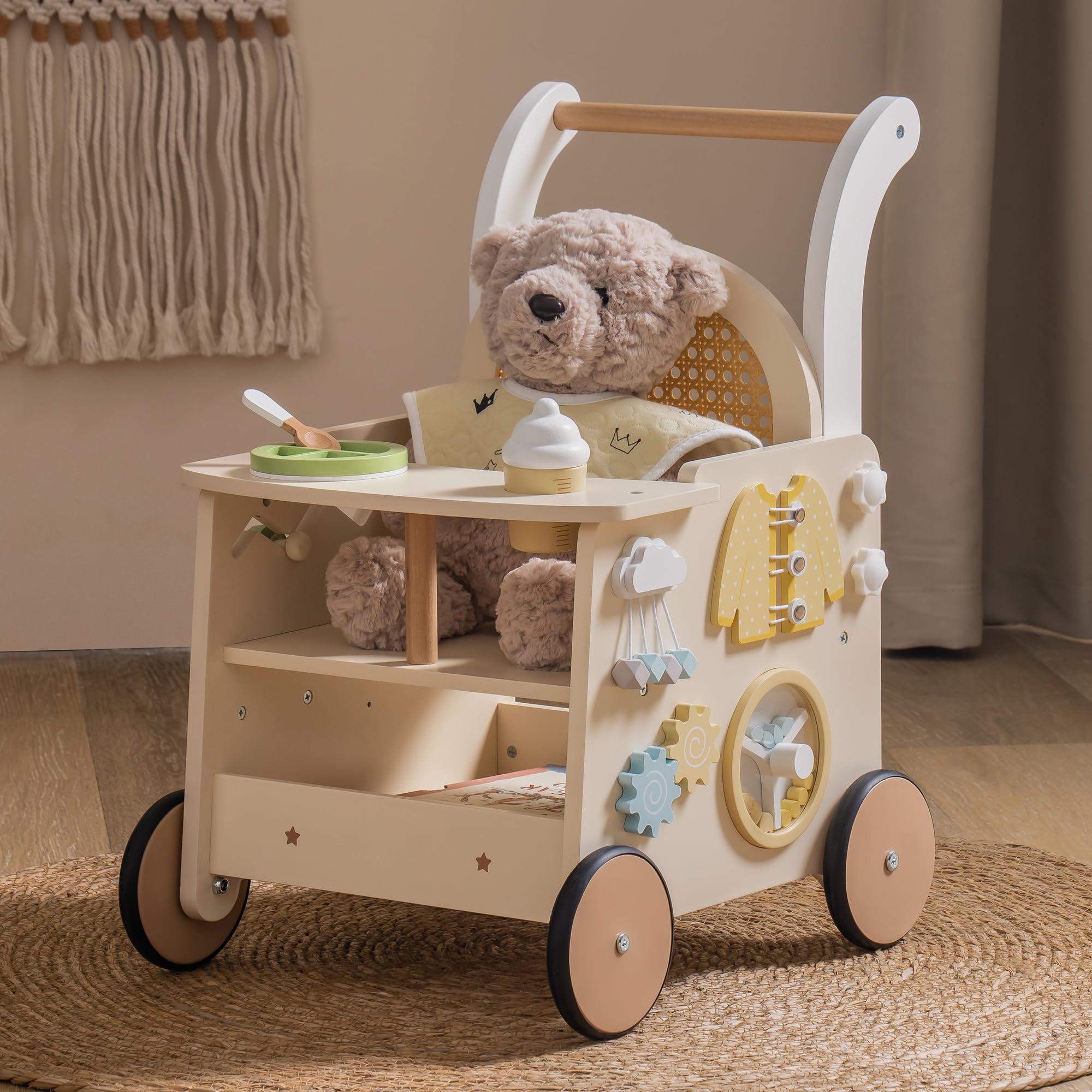 Wooden toy push cart with teddy bear and various toys on a beige background